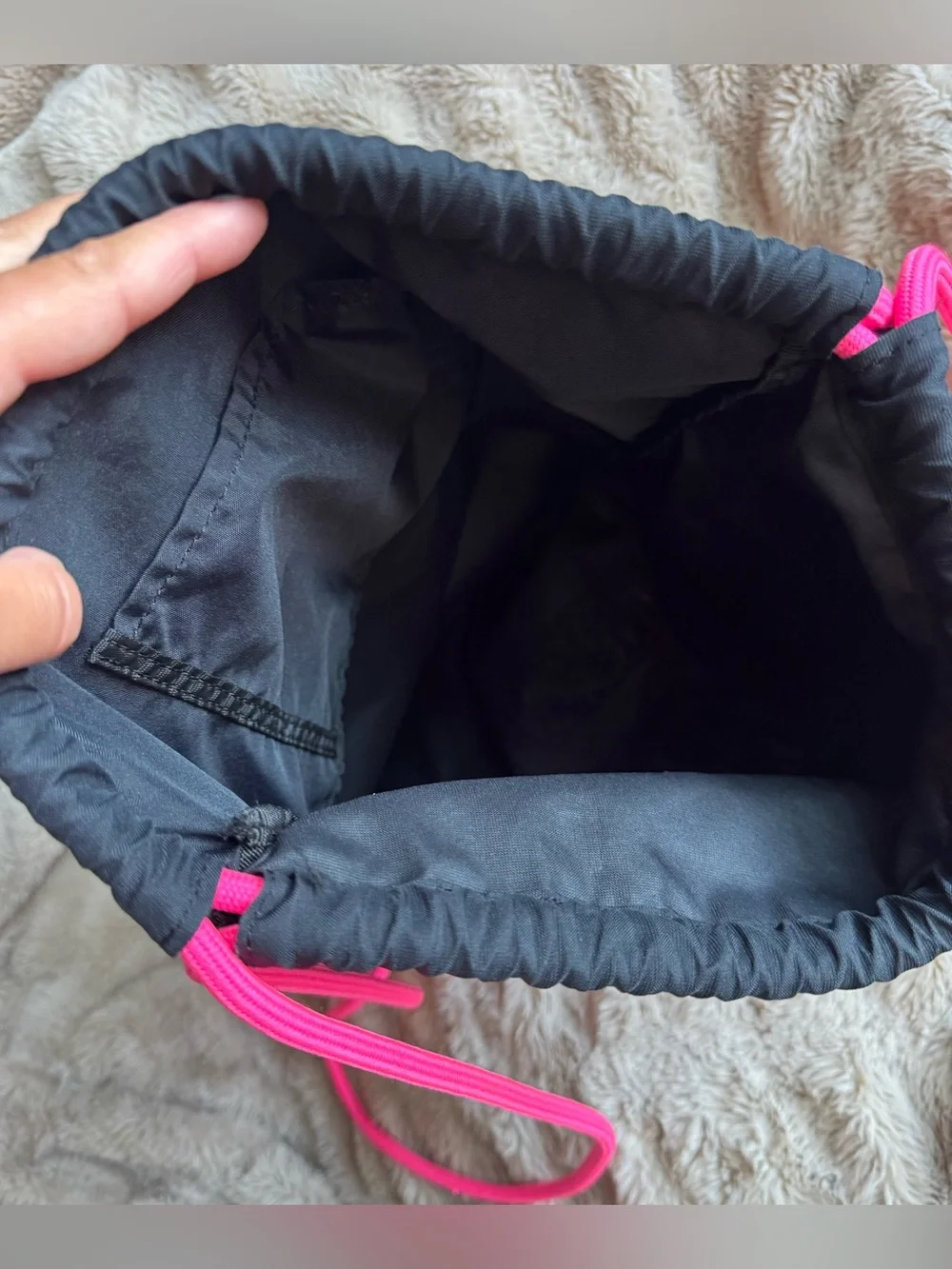 Nike Black Drawstring Backpack with Pink-to-Orange Gradient Logo